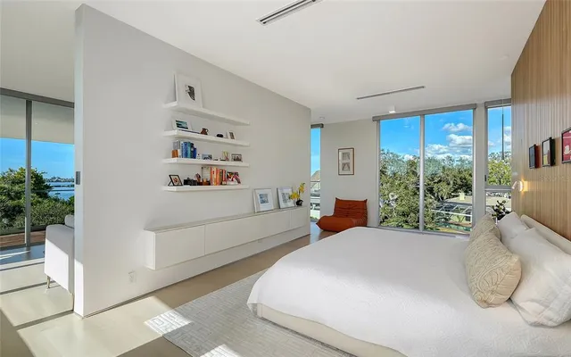 a living room with lots of furniture and a window