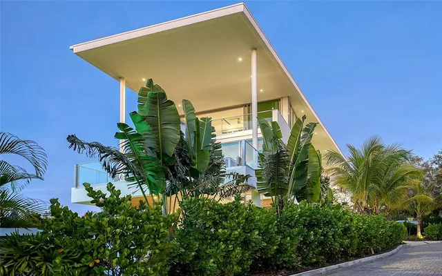 a front view of house with small garden