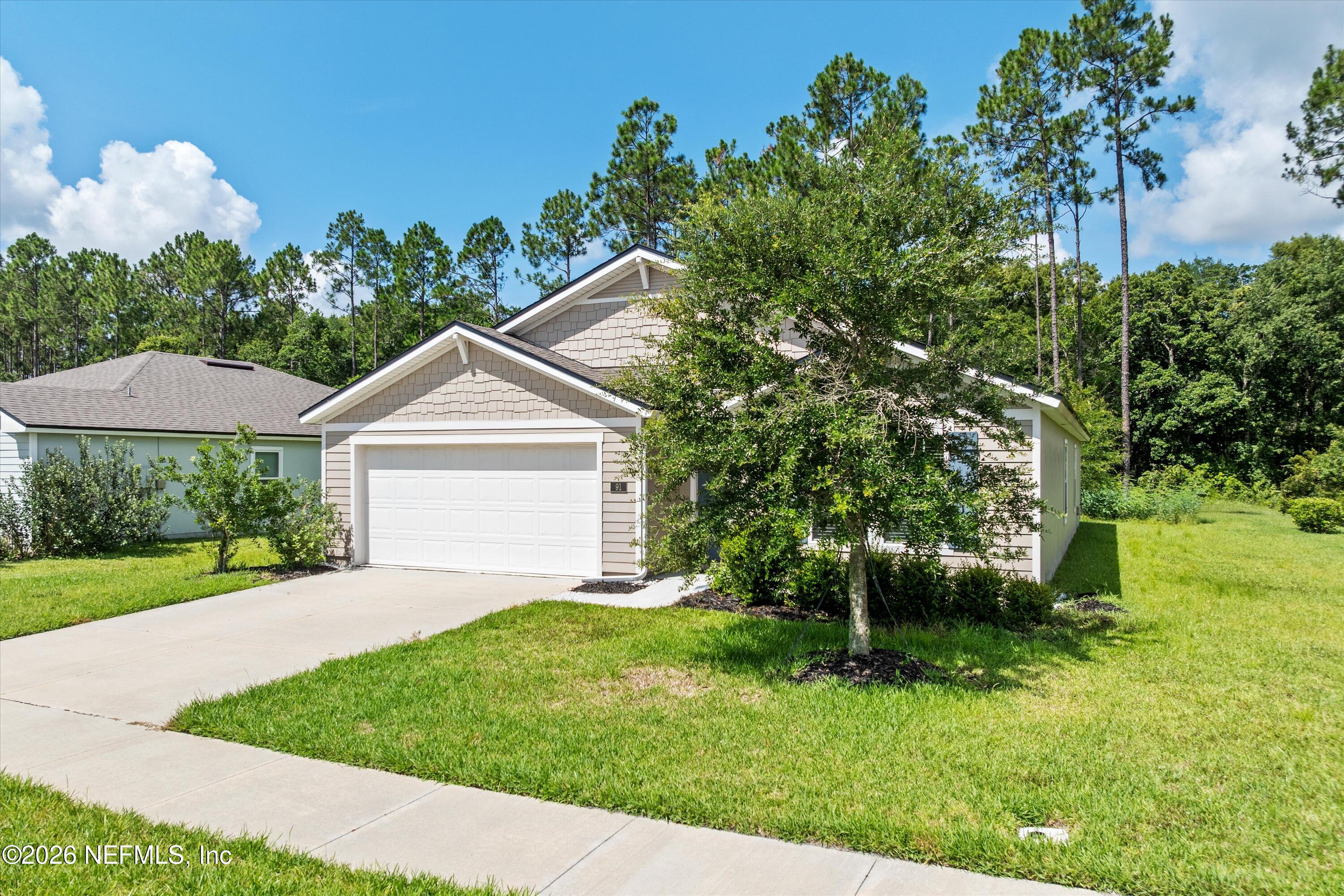 91 Rivertown Road Palm Coast, FL 32137 - Photo 4 of 36 03-Front