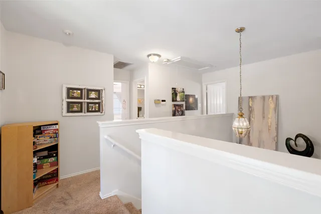 a spacious bathroom with a sink