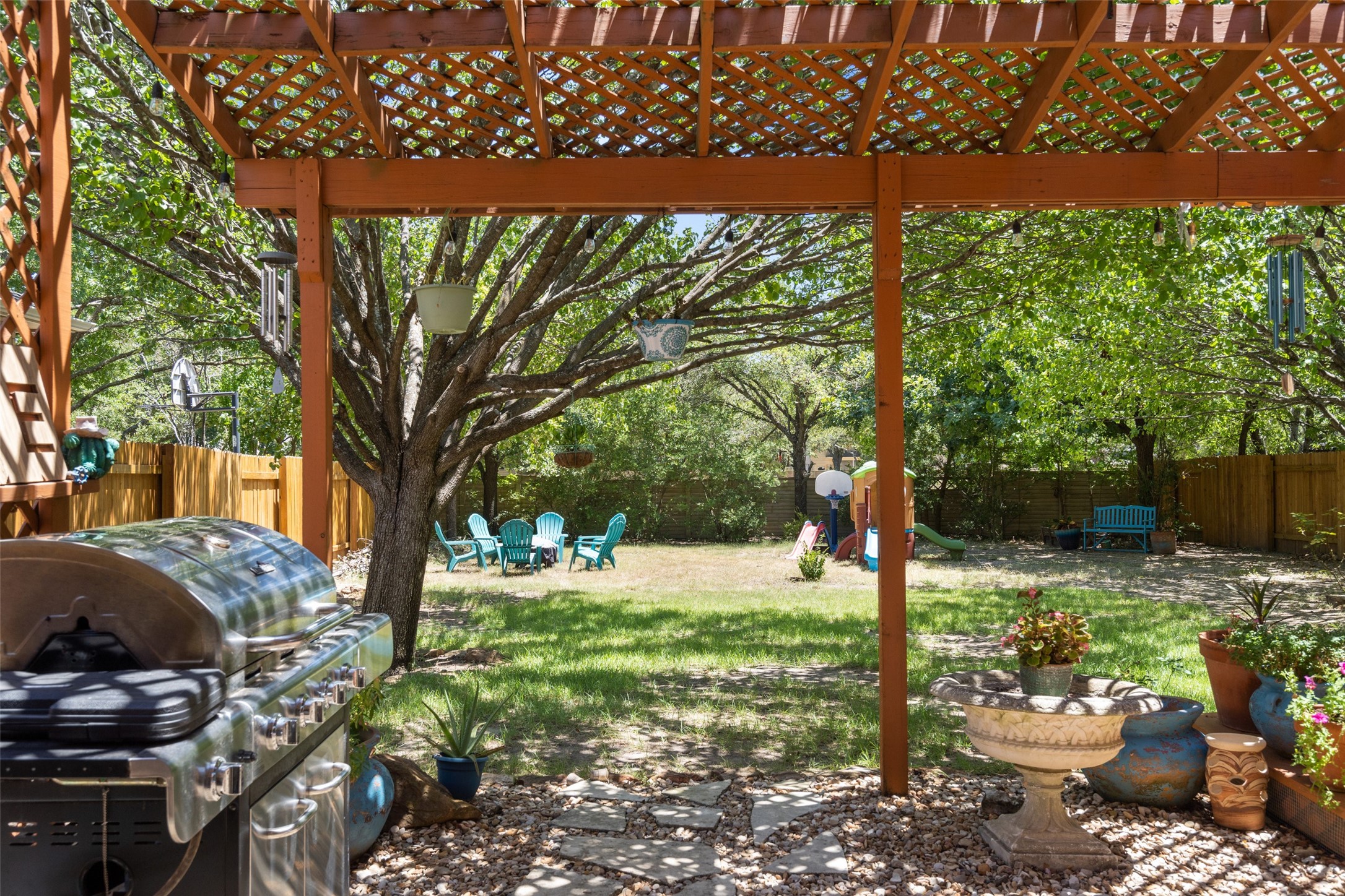 12813 Withers Way Austin, TX 78727 - Photo 30 of 40 a view of a backyard with garden
