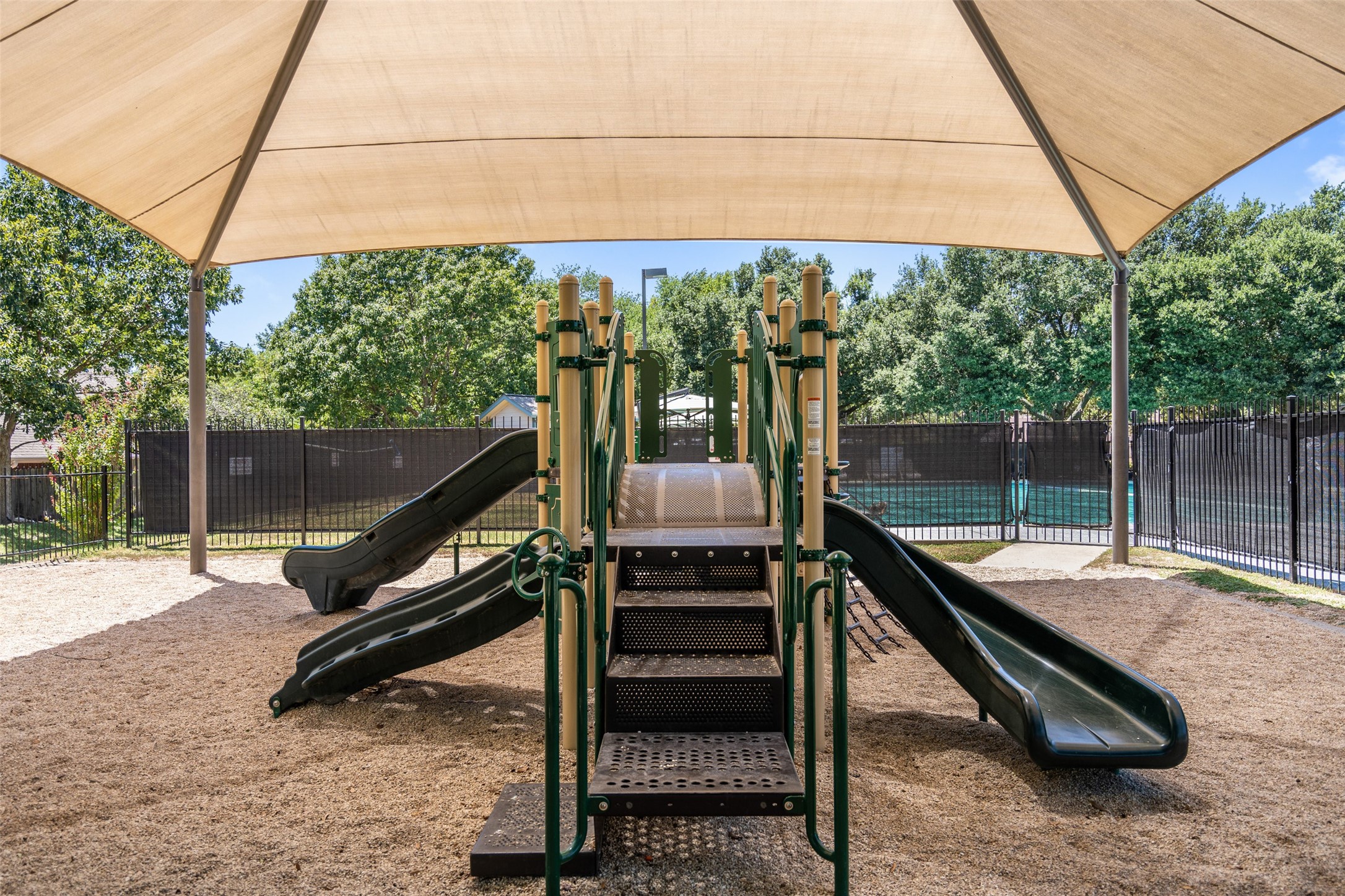 12813 Withers Way Austin, TX 78727 - Photo 33 of 40 a view of a park with a slide