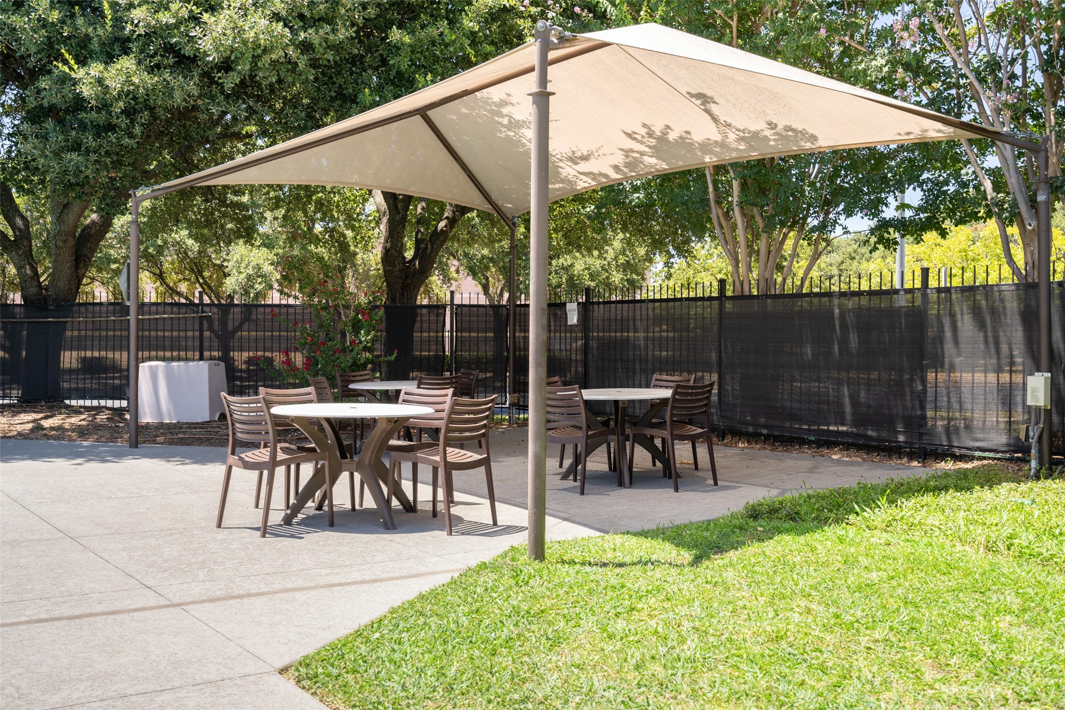 12813 Withers Way Austin, TX 78727 - Photo 34 of 40 a view of a patio with a table chairs and a backyard