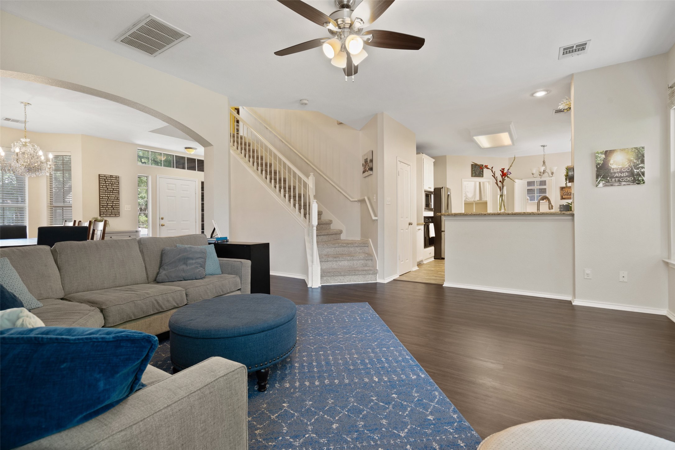 12813 Withers Way Austin, TX 78727 - Photo 7 of 40 a living room with furniture and a wooden floor