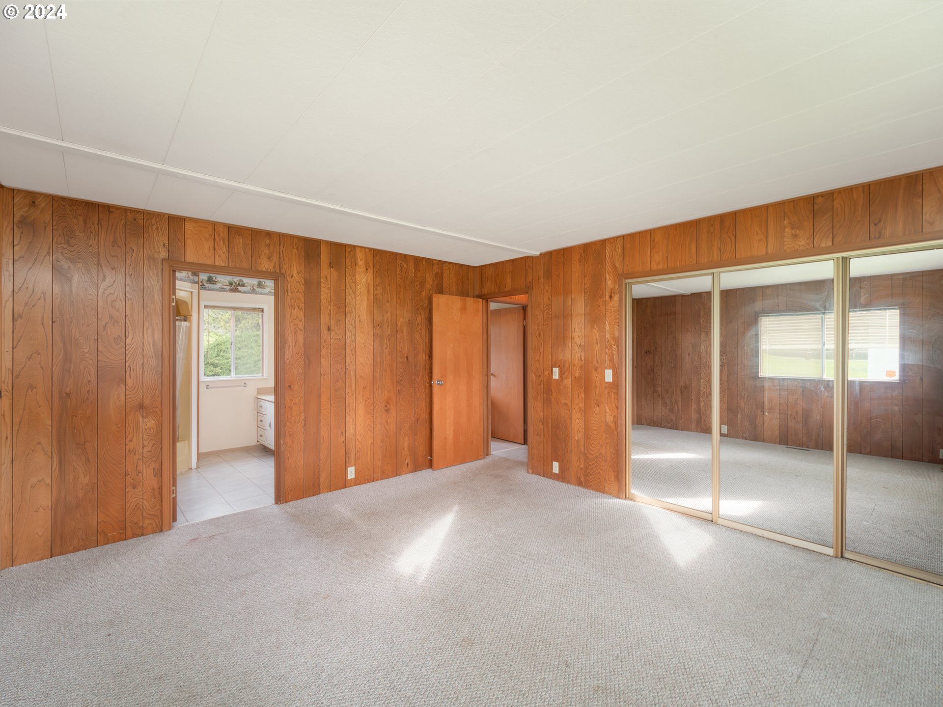 150 Spring Brook Road Myrtle Creek, OR 97457 - Photo 18 of 42 a view of an empty room with window