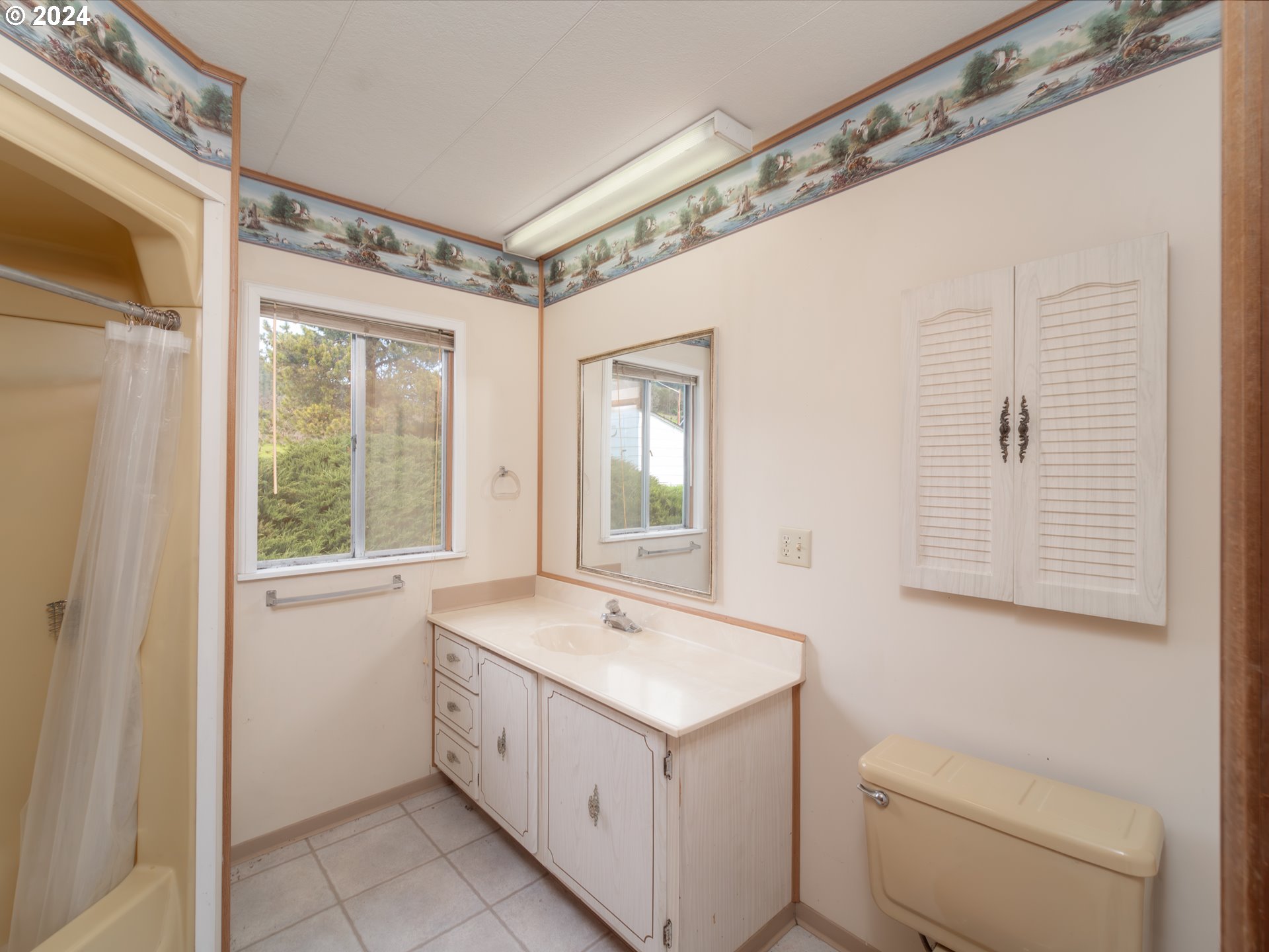 150 Spring Brook Road Myrtle Creek, OR 97457 - Photo 19 of 42 a view of bathroom with a sink and a toilet