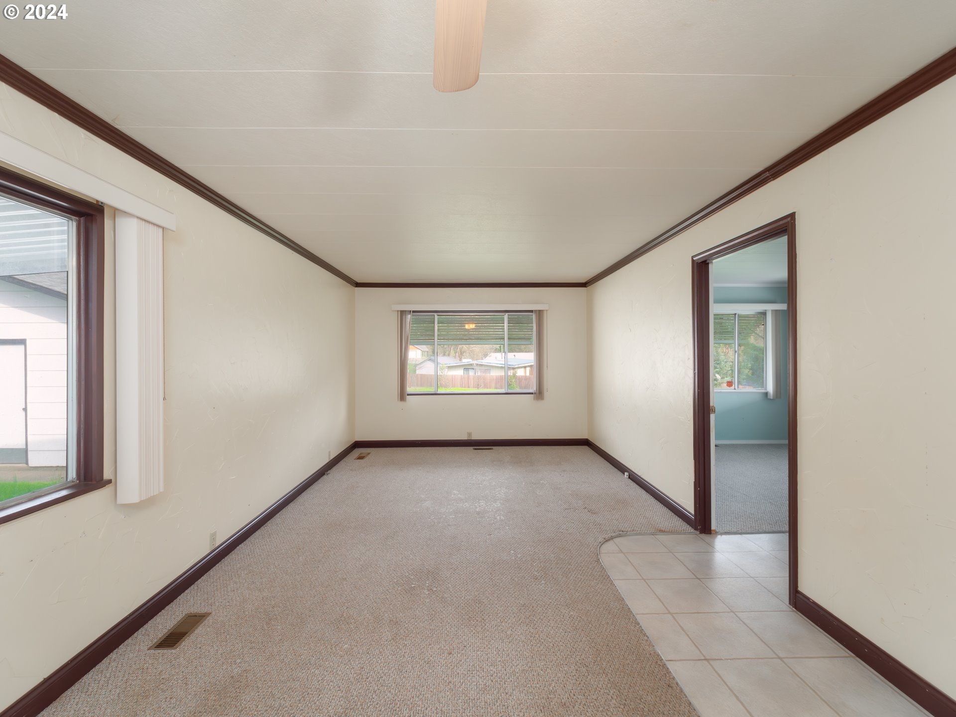 150 Spring Brook Road Myrtle Creek, OR 97457 - Photo 6 of 42 an empty room with windows and closet