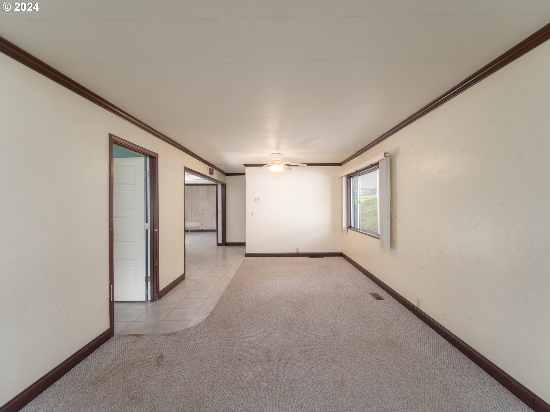 150 Spring Brook Road Myrtle Creek, OR 97457 - Photo 7 of 42 an empty room with windows and closet