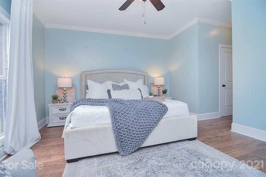 5813 Dudley Road Monroe, NC 28112 - Photo 21 of 44 a bedroom with a bed and window