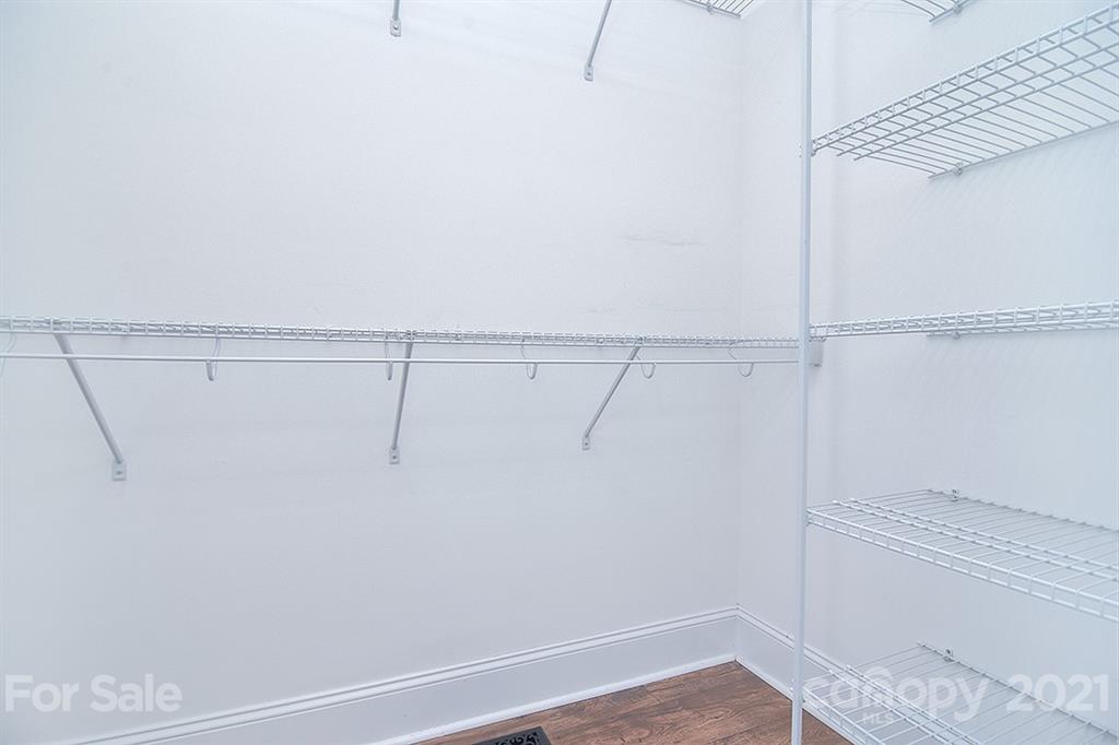 5813 Dudley Road Monroe, NC 28112 - Photo 27 of 44 a view of a room with racks on the wall