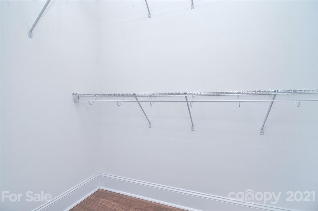 5813 Dudley Road Monroe, NC 28112 - Photo 28 of 44 a view of a room with racks on the wall
