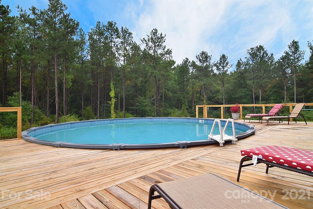 5813 Dudley Road Monroe, NC 28112 - Photo 37 of 44 a view of swimming pool with chairs