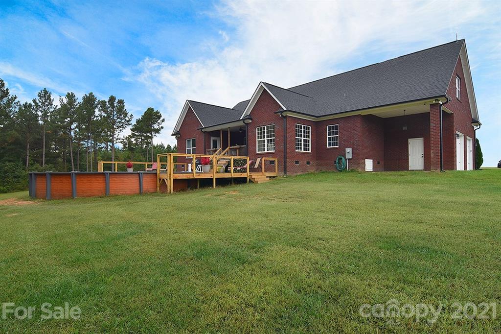 5813 Dudley Road Monroe, NC 28112 - Photo 40 of 44 a view of a house with a big yard