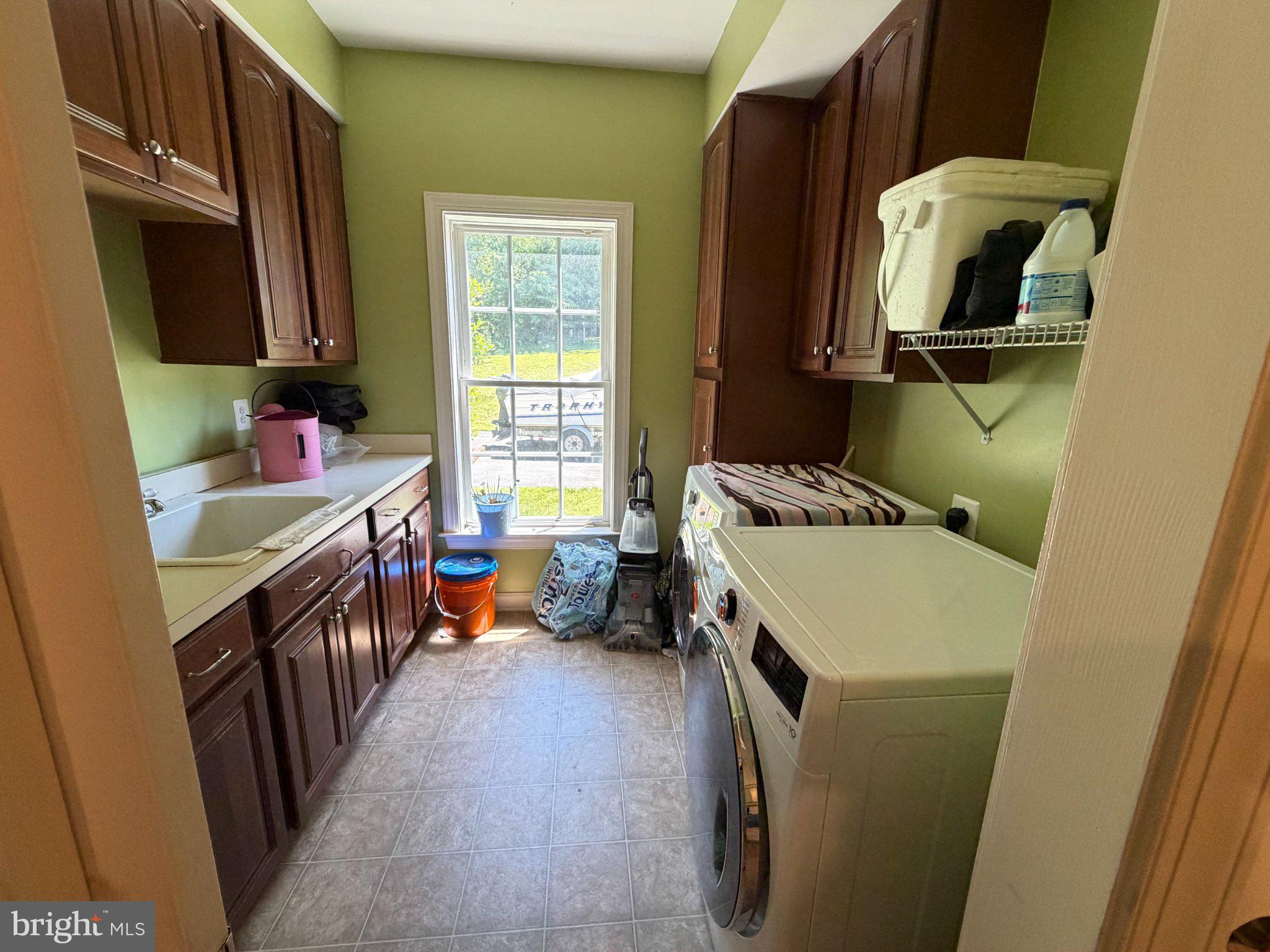 18724 Brooke Road Brinklow, MD 20862 - Photo 52 of 52 Bright and functional laundry space.