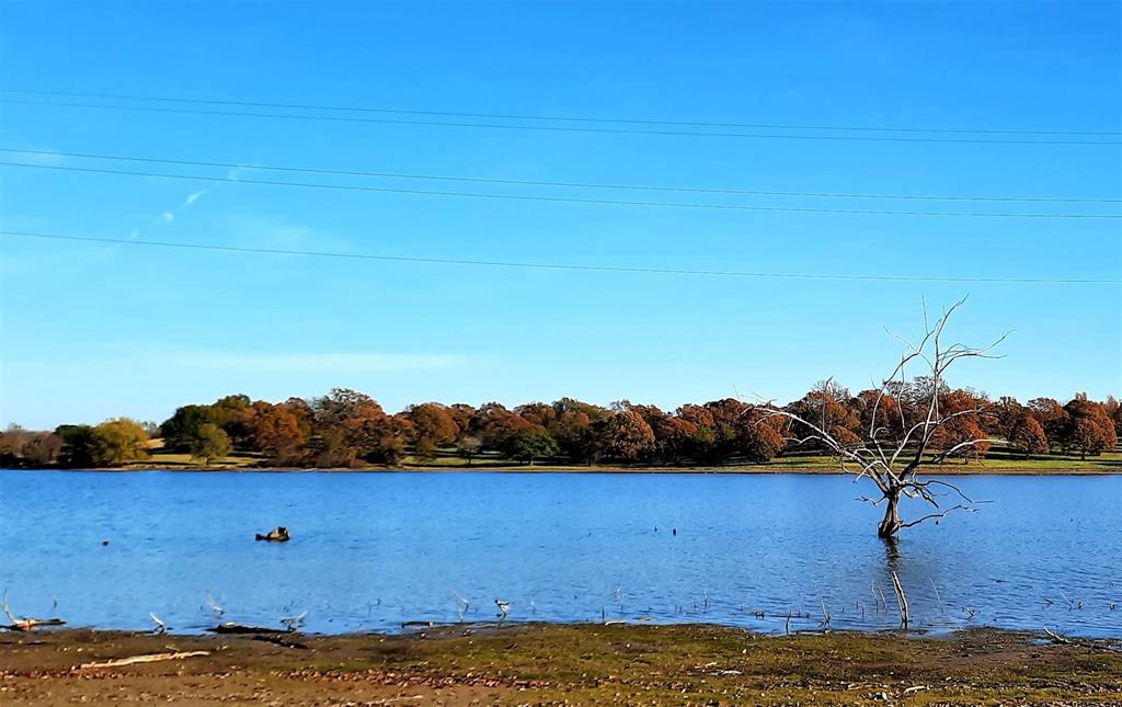 Lot 1 County Road 3328 Emory, TX 75440 - Photo 12 of 17 a view of a lake with houses