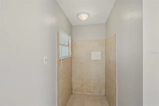 a view of a yard with an outdoor space