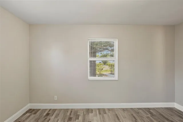 a view of an empty room and window