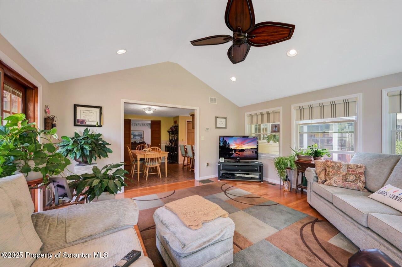 1020 Sleepy Hollow Road Clarks Summit, PA 18411 - Photo 22 of 62 a living room with furniture and a large window