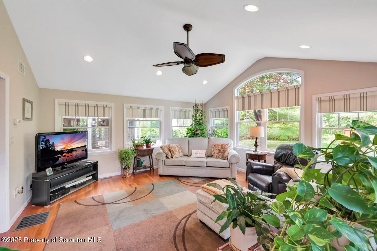 1020 Sleepy Hollow Road Clarks Summit, PA 18411 - Photo 23 of 62 a living room with patio furniture and a flat screen tv