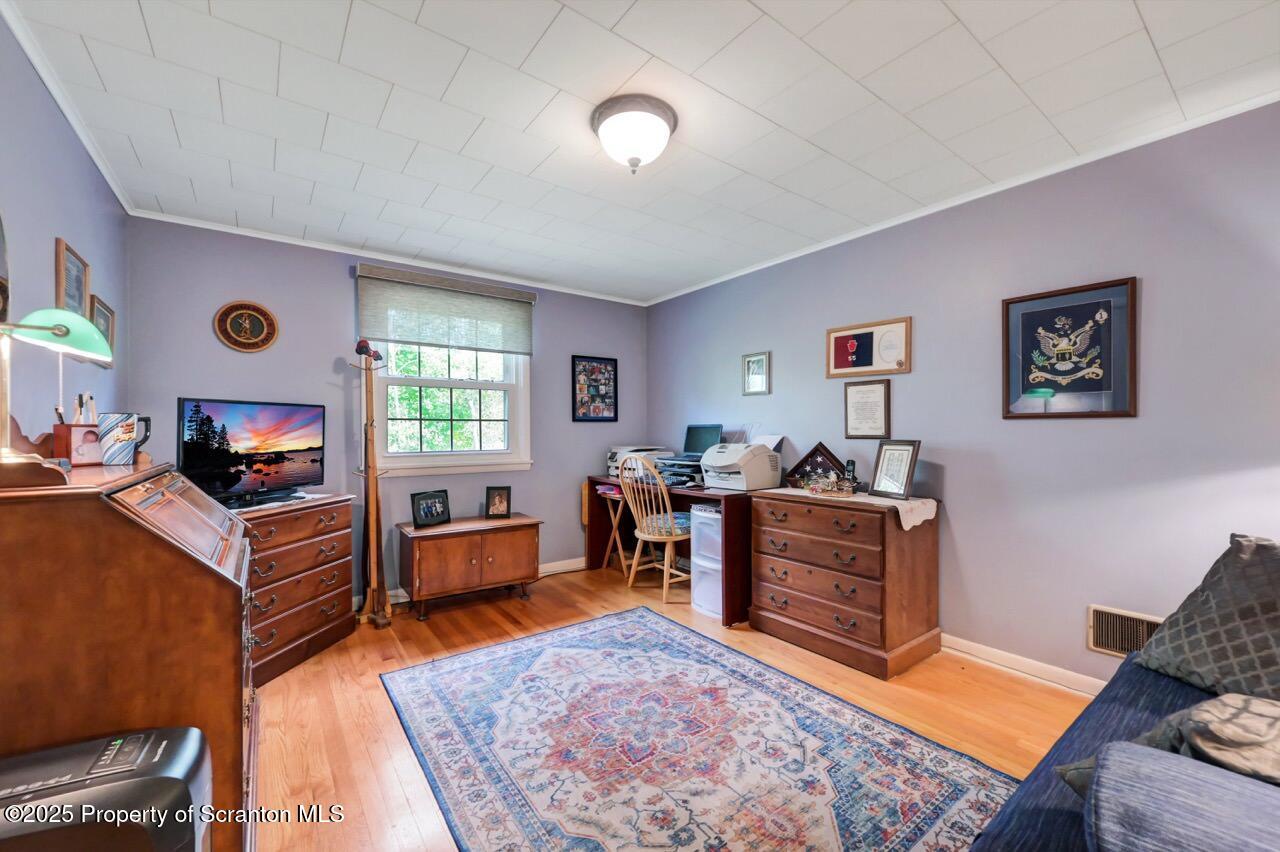1020 Sleepy Hollow Road Clarks Summit, PA 18411 - Photo 33 of 62 a living room with furniture and a flat screen tv