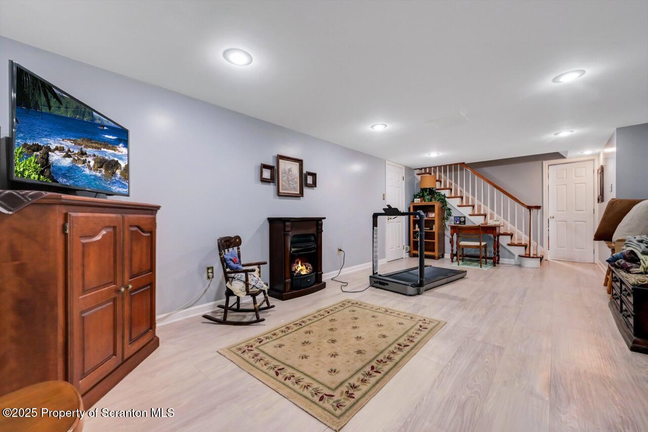 1020 Sleepy Hollow Road Clarks Summit, PA 18411 - Photo 43 of 62 a view of a livingroom with furniture and a flat screen tv