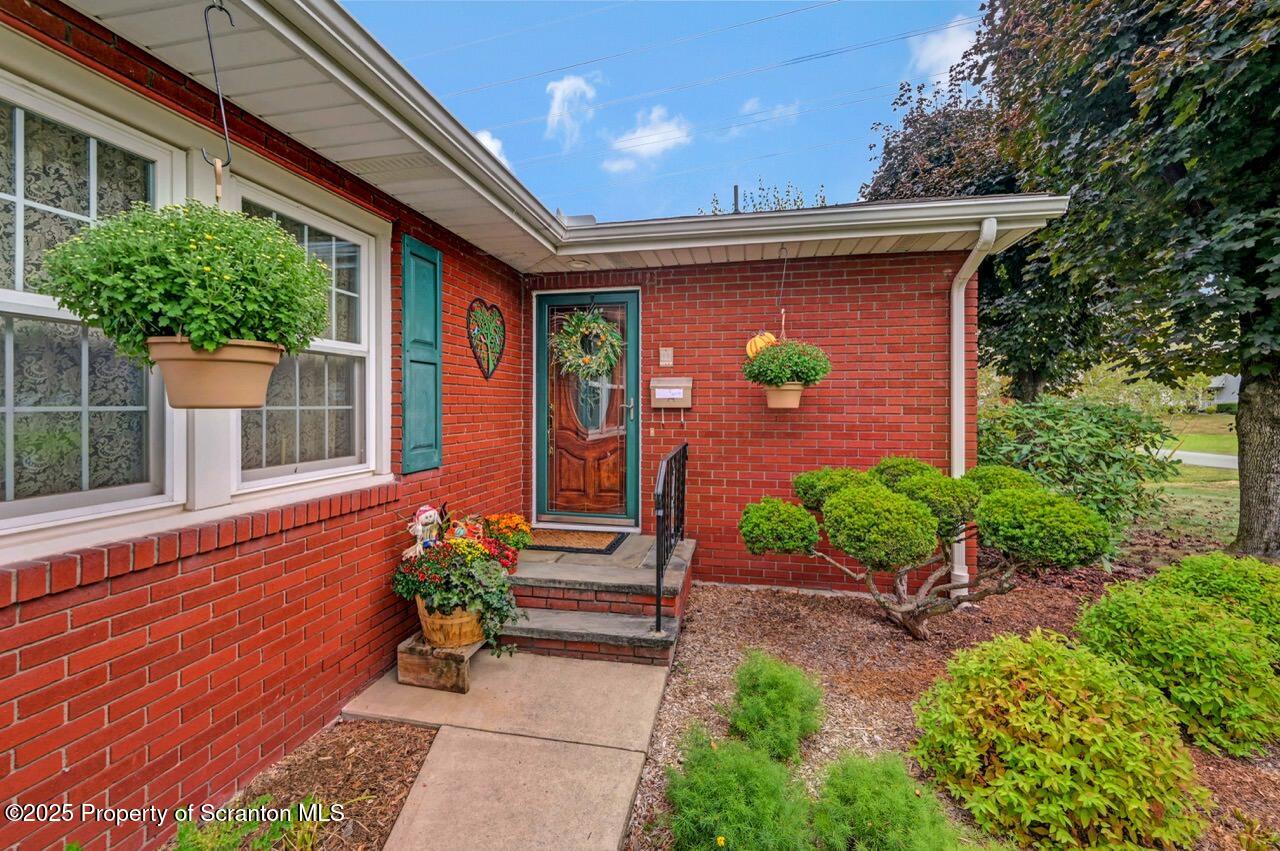 1020 Sleepy Hollow Road Clarks Summit, PA 18411 - Photo 5 of 62 a front view of a house with a yard