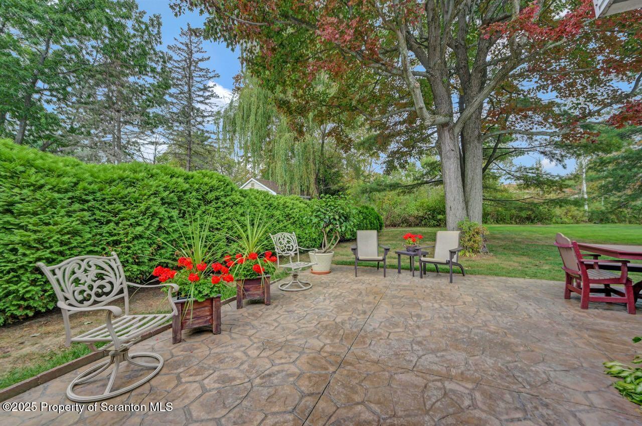 1020 Sleepy Hollow Road Clarks Summit, PA 18411 - Photo 58 of 62 a view of a backyard with sitting area and furniture