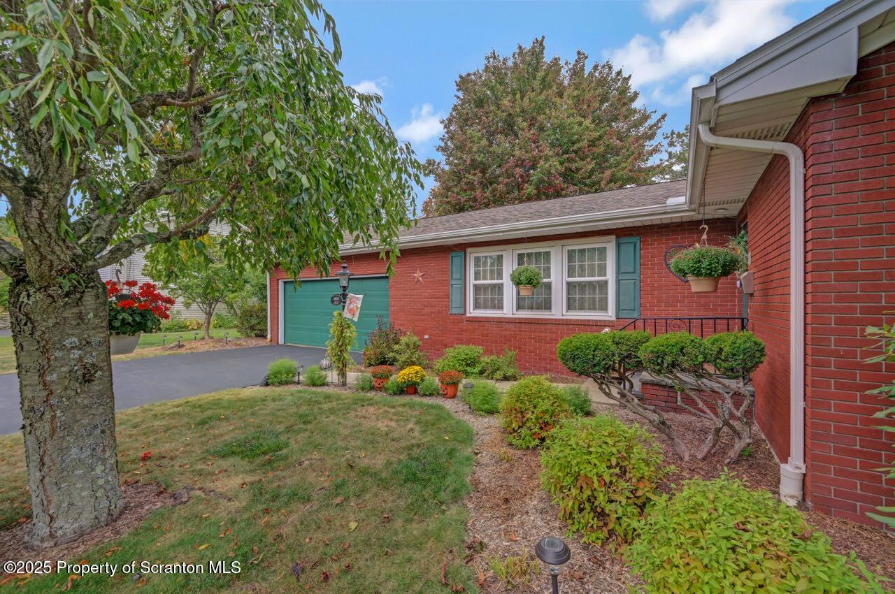 1020 Sleepy Hollow Road Clarks Summit, PA 18411 - Photo 59 of 62 a front view of a house with garden
