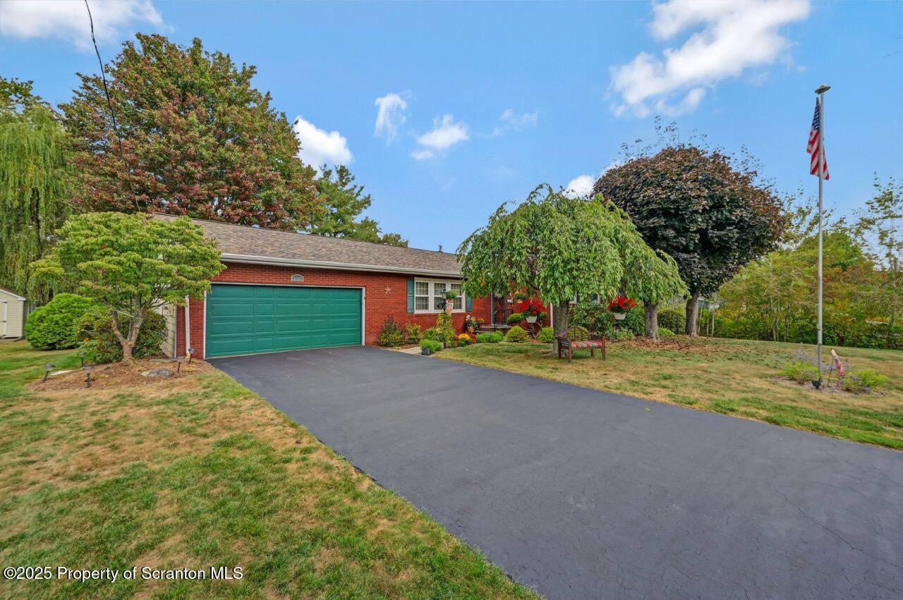 1020 Sleepy Hollow Road Clarks Summit, PA 18411 - Photo 60 of 62 a view of a house with entertaining space and a tree