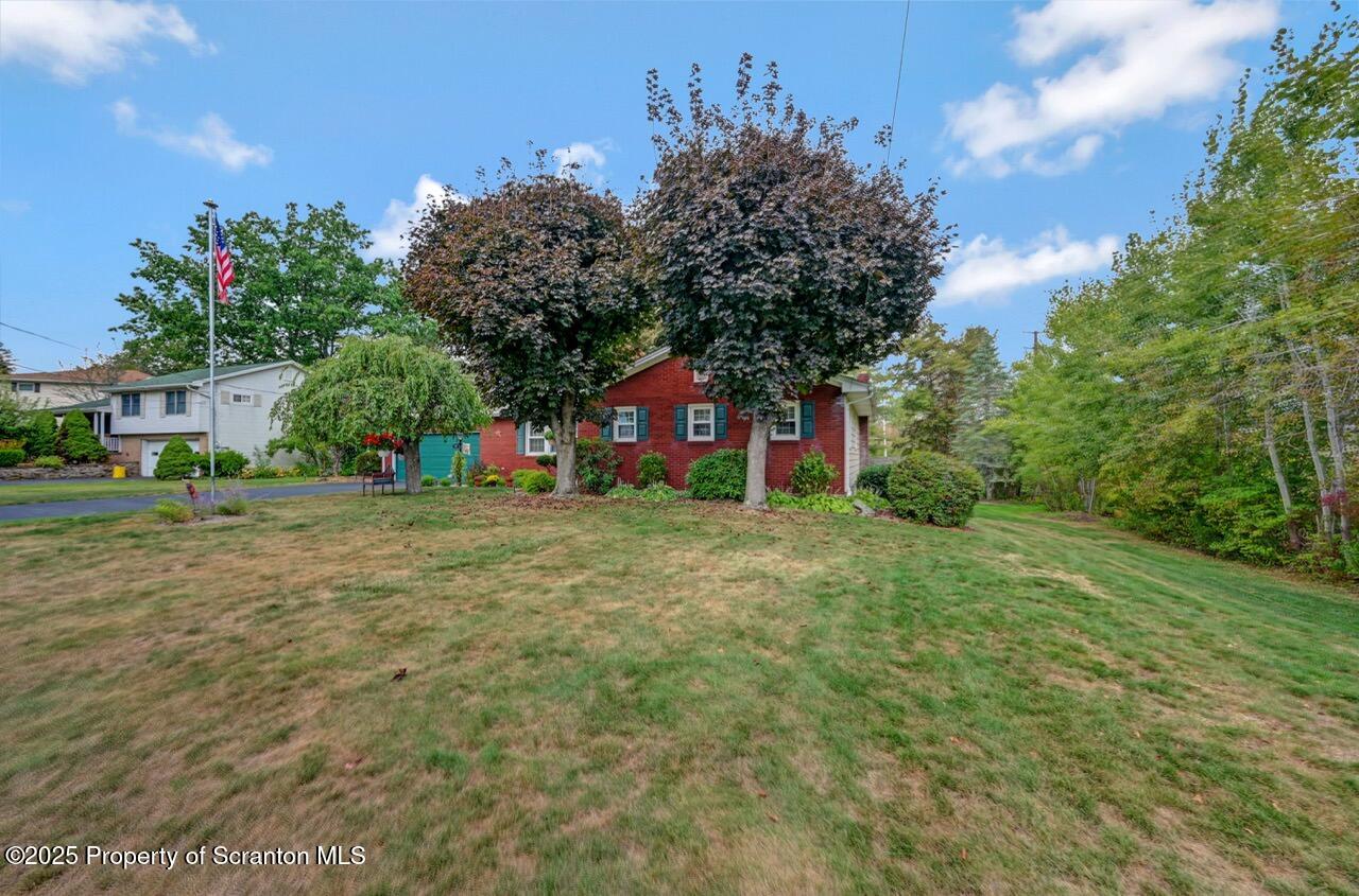 1020 Sleepy Hollow Road Clarks Summit, PA 18411 - Photo 62 of 62 a view of outdoor space with deck and tree