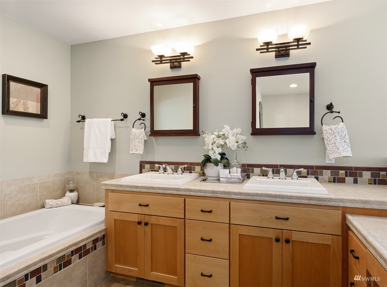 5166 Bayview Road Langley, WA 98260 - Photo 18 of 40 a bathroom with a double vanity sink mirror and