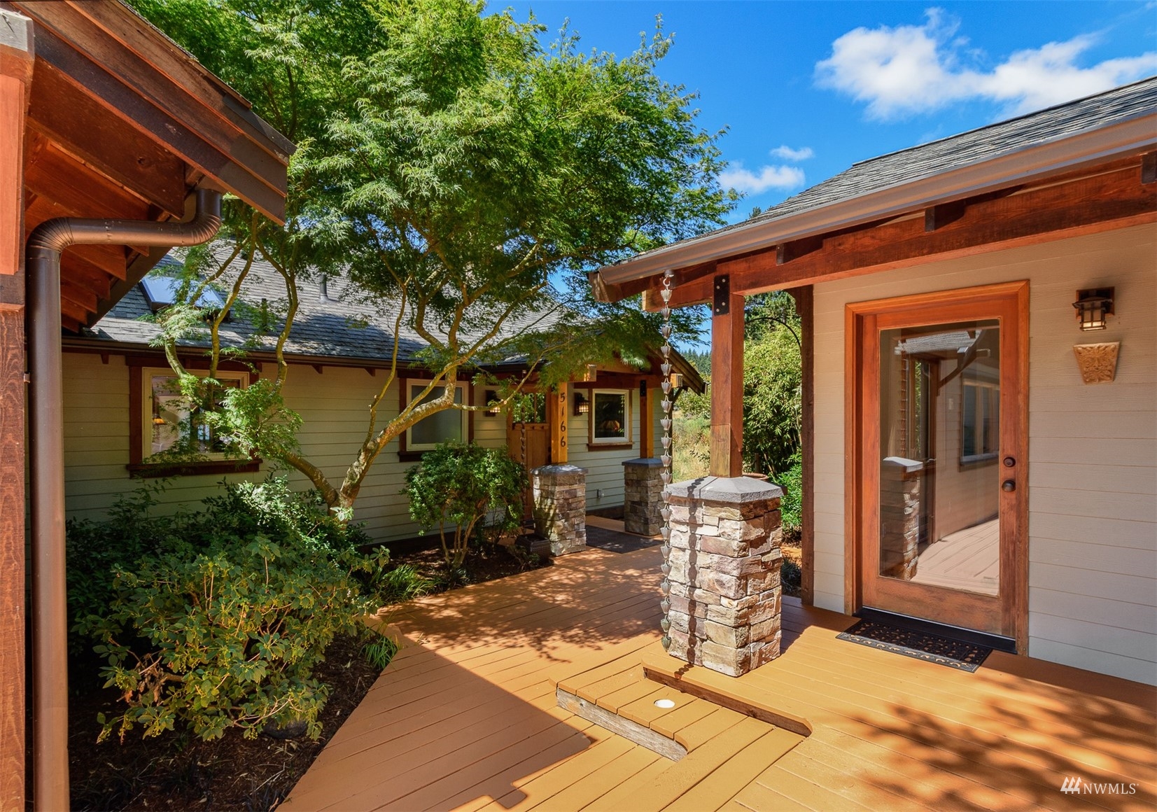 5166 Bayview Road Langley, WA 98260 - Photo 3 of 40 a view of a house with a patio