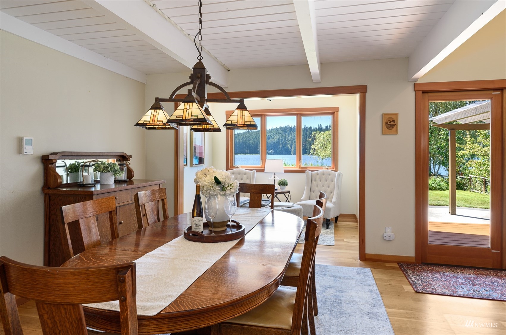 5166 Bayview Road Langley, WA 98260 - Photo 9 of 40 a view of a dining room with furniture window and outside view