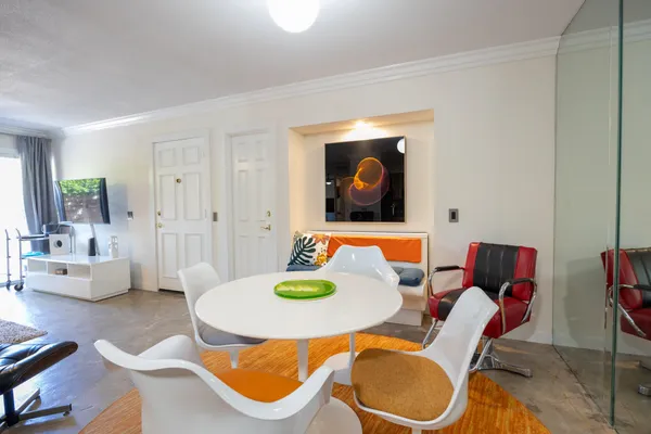 a living room with a couch and a table