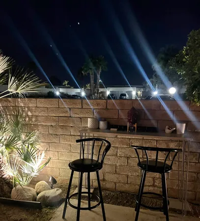 a view of a chairs and tables in patio