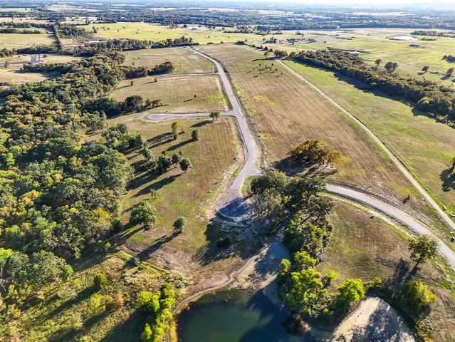 a view of a houses with a ocean