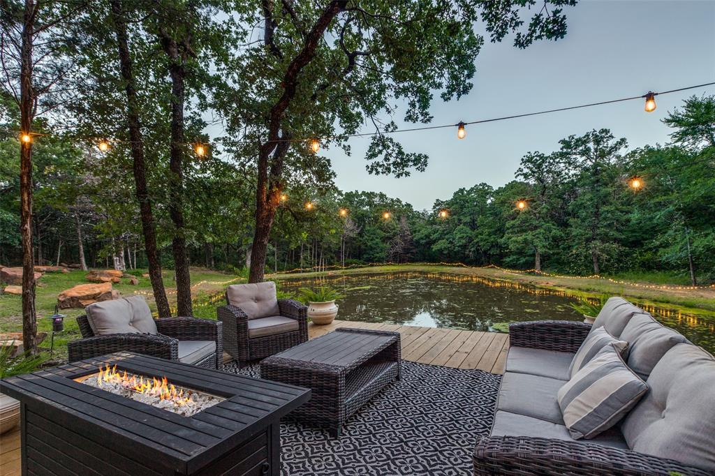 1619 Bloomfield Road Valley View, TX 76272 - Photo 33 of 39 The deck overlooking the pond. The deck has electricity.