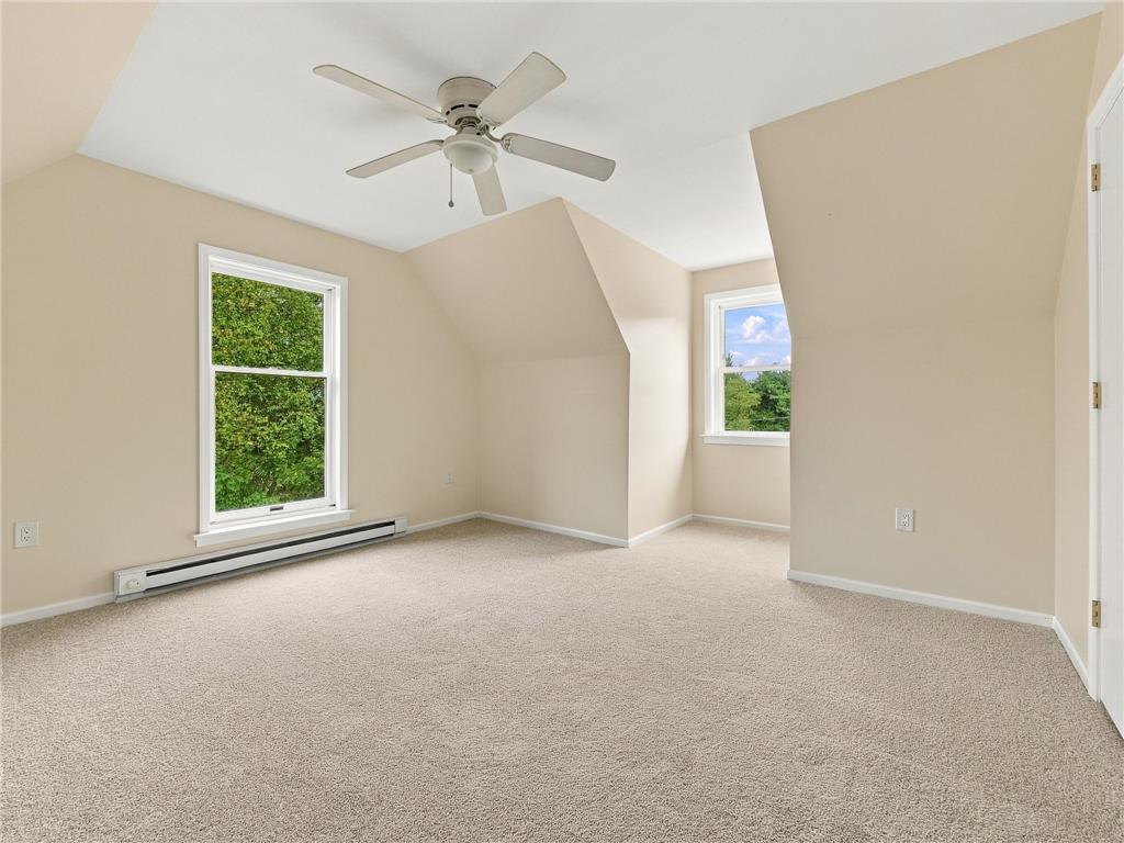 90 Gun Club Road Palmerton, PA 18071 - Photo 44 of 58 Sloped ceilings and plush carpeting define this charming upper-level bedroom.