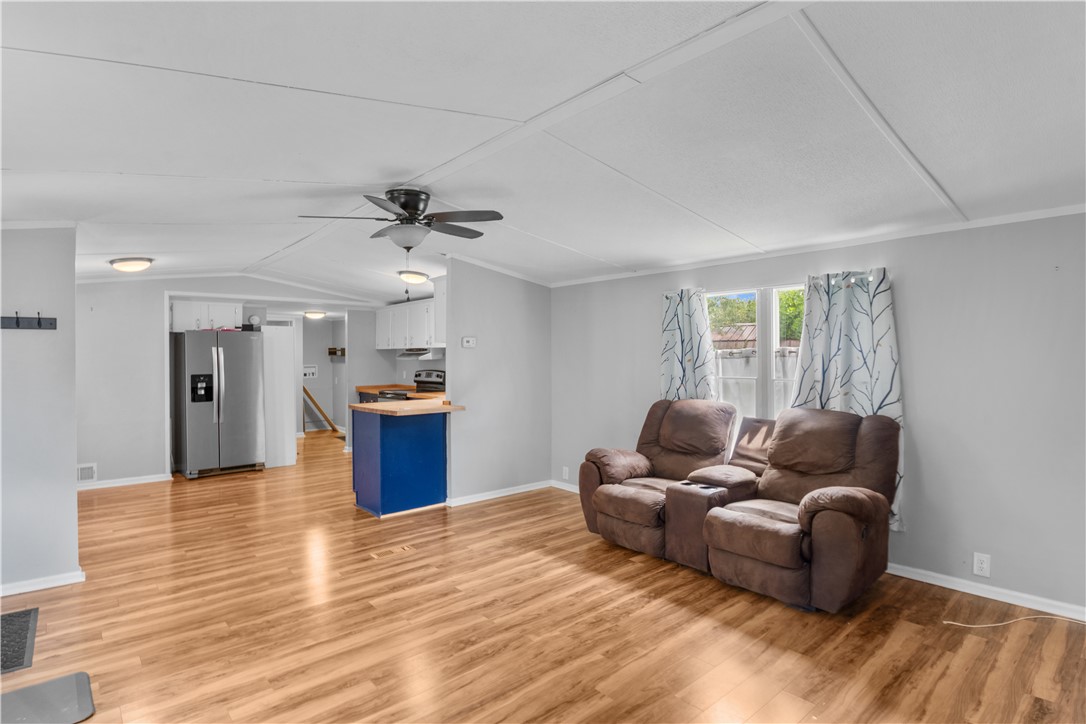 169 West Bagwell Road Liberty, SC 29657 - Photo 29 of 29 An open floorplan seamlessly connects the living area and kitchen, perfect for relaxed daily living.