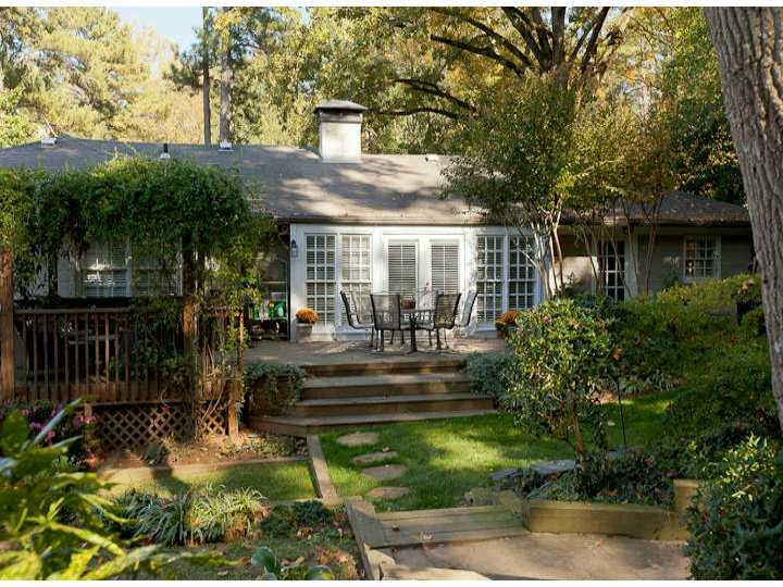 3796 Powers Ferry Road Northwest Atlanta, GA 30342 - Photo 1 of 1 a view of a house with backyard and sitting area
