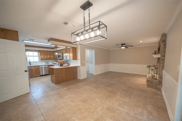 a view of a kitchen with a sink