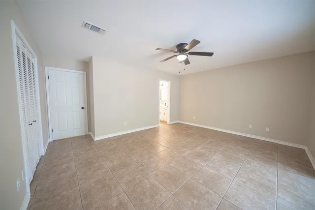 a bathroom with a shower and a toilet
