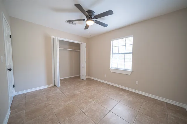 a bathroom with a double vanity sink and mirror