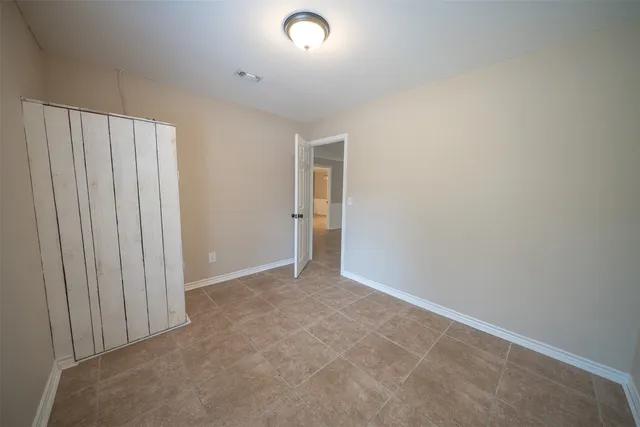an empty room with an entryway