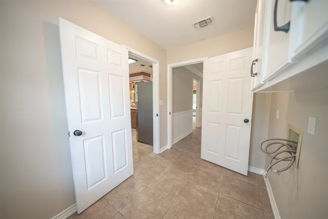 a kitchen with a sink a counter top space and appliances