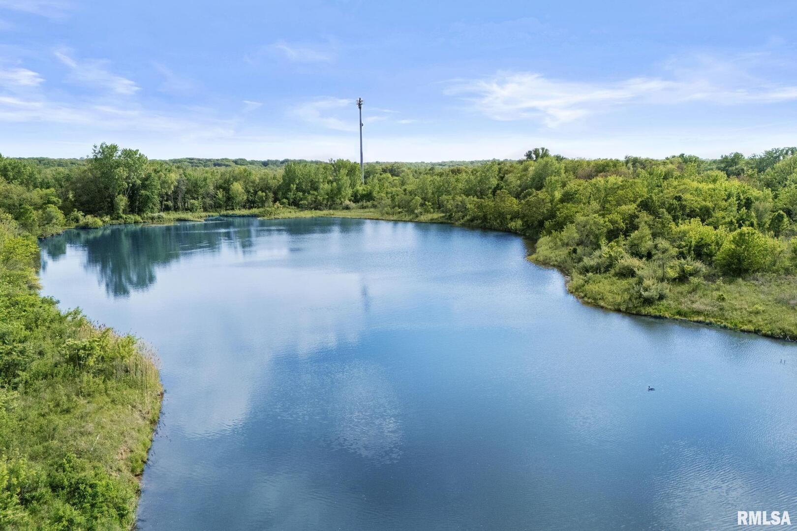 7300 John Deere Road Moline, IL 61265 - Photo 10 of 10 a view of a lake with a city