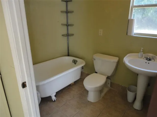 a bathroom with a sink and a toilet