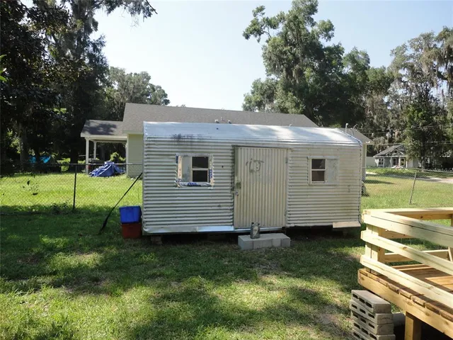 a view of a backyard with a garden