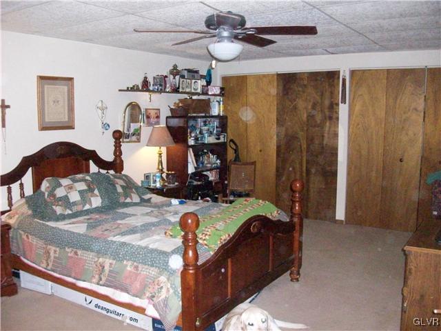 547 Turkey Ridge Road Mount Bethel, PA 18343 - Photo 13 of 14 a bedroom with bed and window