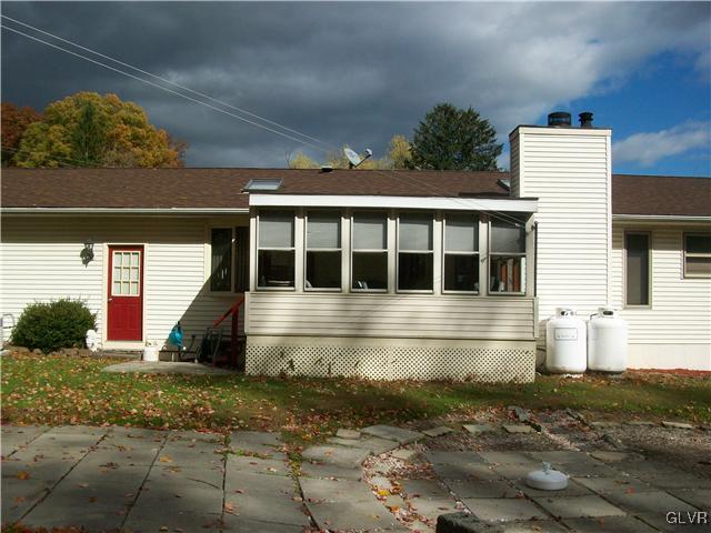 547 Turkey Ridge Road Mount Bethel, PA 18343 - Photo 14 of 14 a view of house with a yard